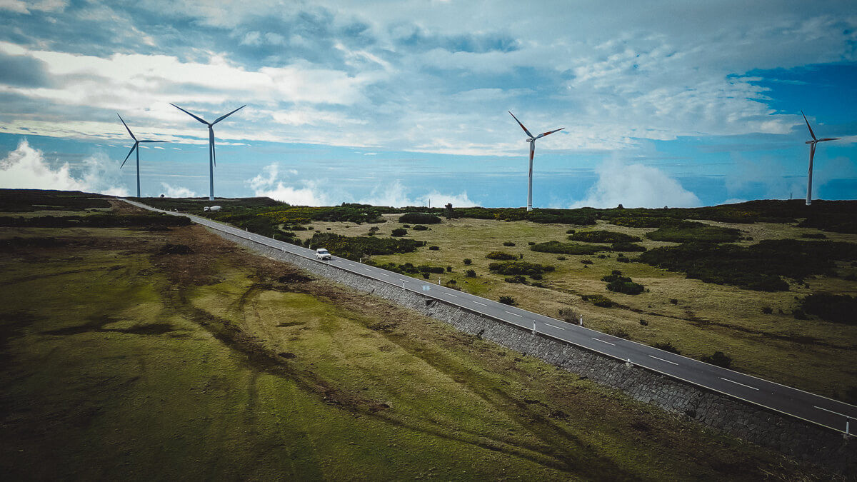 straight road on top of madeira threw green landscape